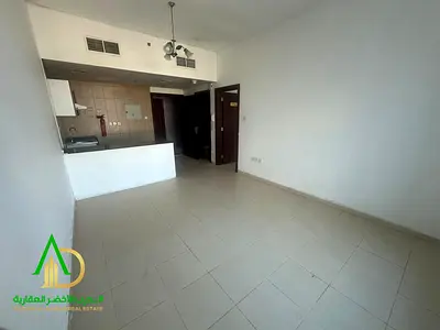 For annual rent: 1-bedroom apartment with a living room at City Tower – Ajman (Al Nuaimiya 3). Located opposite Grand Mall, behind the British Schools