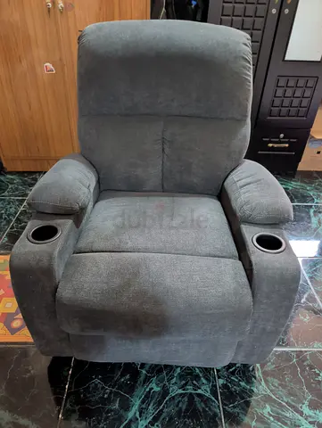 Comfortable grey fabric recliner chair with cup holders - good condition