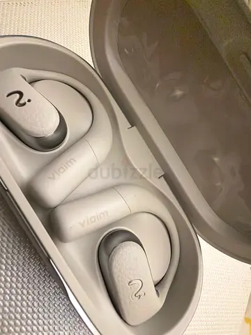White over-ear wireless earbuds with charging case (used) - comfortable sports fit