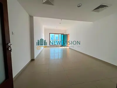 A luxurious 2-bedroom apartment with a maid's room in Al Mamzar, Sharjah, featuring a sea view, free AC, free parking, free gym, swimming pool, and fr