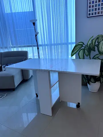 White Modern Extendable Dining Table on Wheels — Good Condition