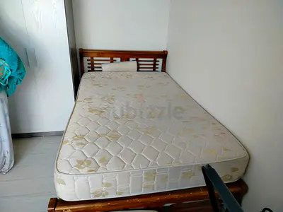 Single wooden bed frame with mattress - good condition