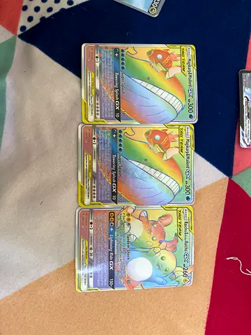 Three TAG TEAM Pokémon GX Full Art Cards — Magikarp/Wailord Raichu/Alolan Raichu
