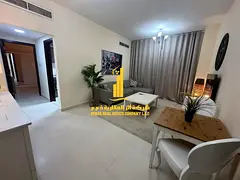 Luxury apartment, second occupancy, one bedroom and living room with a balcony and open view. Ajman,