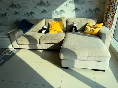 Light grey L-shaped 3-seater sofa with chaise - good condition