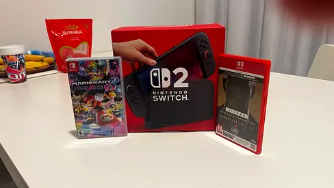 Nintendo Switch 2 with Mario Kart 8 deluxe and hitman signature edition dlc included.