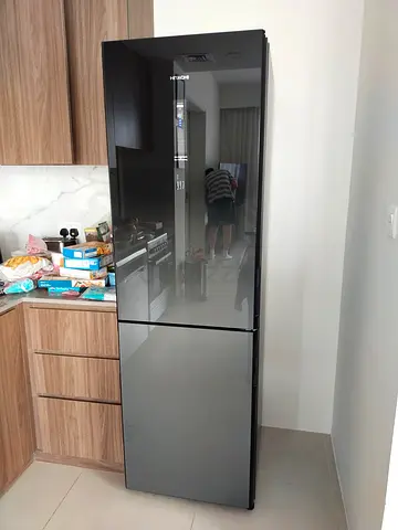 Hitachi New model Bottom Freezer Refrigerator featuring a modern glass