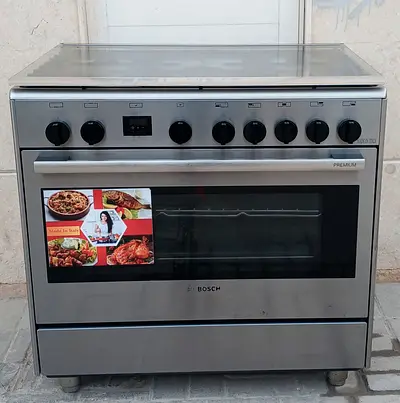 Bosch brand gas cooker, 5 burners, condition is perfect working. size is 90x60cm