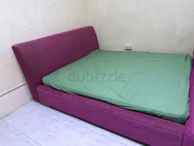 Purple fabric double bed frame with headboard (mattress included)- good used condition