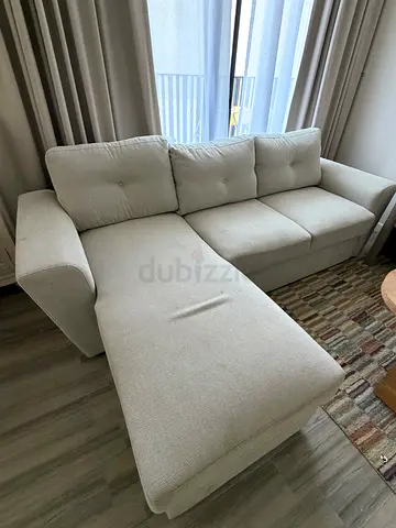 IKEA L-Shaped Sofa Bed with Storage – AED 700