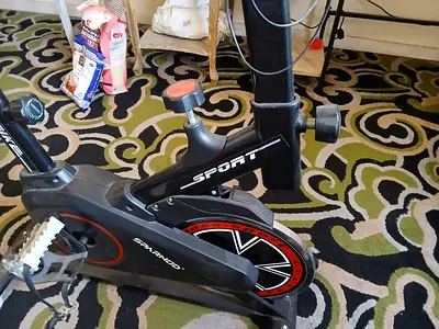 Used indoor spin exercise bike - sturdy frame, single resistance knob