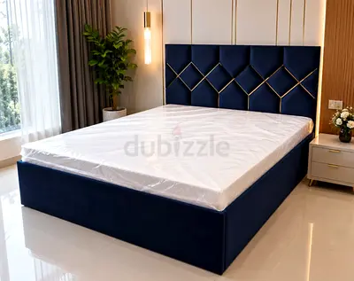Queen size upholstered storage bed with navy velvet headboard