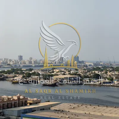 Monthly furnished studio for rent in Al Rashidiya 1, Ajman with clean furniture, balcony, waterfront view, spacious layout, all bills included.
