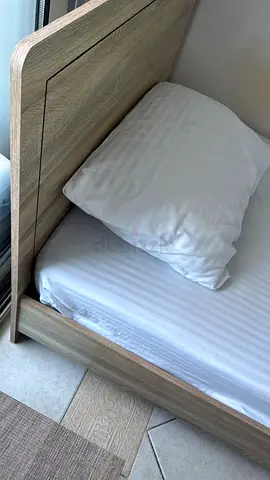 Single wooden bed frame with headboard - light oak finish