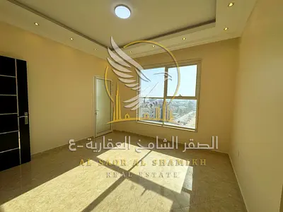 للايجار السنوي شقة ثلاث غرف وصالة مع باركن وشهر مجانا في عجمان منطقة الروضة امتداد شارع خليفة بجور بنك ابوظبي التجاري  مع تسهيلات في الدفع تصل الي 6