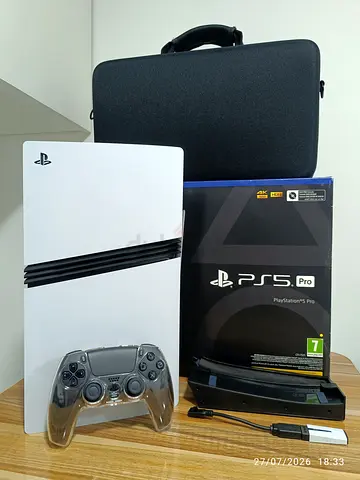 PlayStation 5 Pro bundle with stand, travel case and free game - Excellent Condition