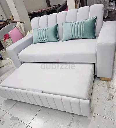 Light grey 2-seater pull-out sofa bed with storage, like new