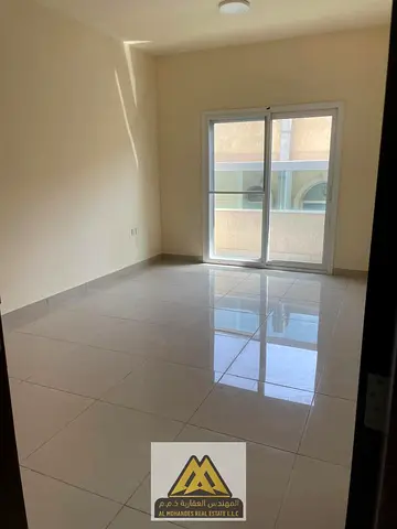Two-bedroom apartment with a living room | Al Jurf 2 | Annual rent | Excellent size | Prime location | Close to the Dubai and Sharjah exit