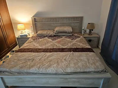 King size wooden bed frame with headboard and 2 matching bedside tables dresser