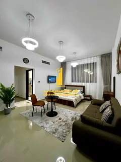 For monthly rent in Ajman - Studio apartment semi-detached kitchen, open view, fully furnished new w