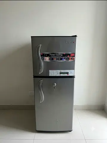 Compact double-door refrigerator - good condition, stainless steel finish