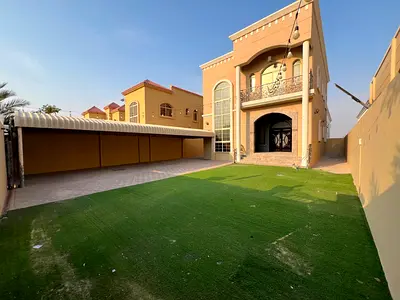 Luxury villa for family living in Al Muwaihat 1, Ajman, 5 bedrooms, living room, majlis, and roof terrace. Strategically located near Dubai, priced at
