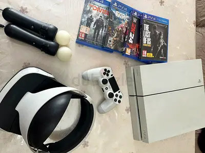 Sony PlayStation 4 White Bundle with VR Headset and Games