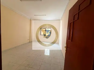 **Spacious 1BR apartment for annual rent in Al Qasimia, Sharjah. Balcony, spacious layout, central AC, free maintenance, and close to Dubai exit.**