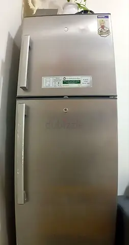 Silver Double-Door Refrigerator - Good Working Condition