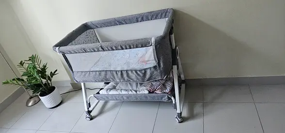 4 in 1 Light grey bedside bassinet with storage shelf and wheels - good condition