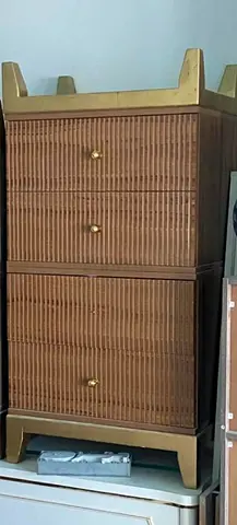 Vintage rattan-style wooden storage cabinet with three drawers