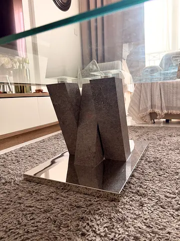 Glass coffee table with mirrored geometric base - good condition