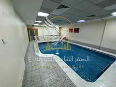 Beautiful two-bedroom apartment with a living room balcony free gym and swimming pool access and bui
