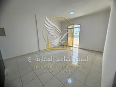 For annual rent in Al Rashidiya 3Ajman a one-bedroom apartment with built-in wardrobes, a spacious k