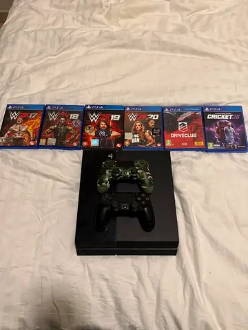 Sony Playstation 4 Fat Console With 2 Controllers and 6 Games