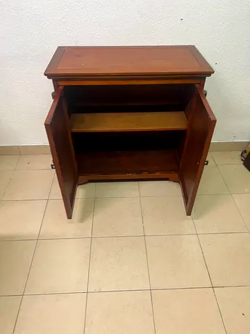 Wooden two-door storage cabinet with shelf — good condition