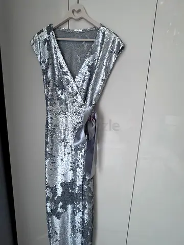 Stunning silver evening dress embroidered with sequins and satin sash. Perfect condition