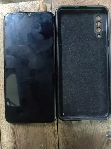 Used Android smartphone with protective flip case - good working condition galaxy a30s