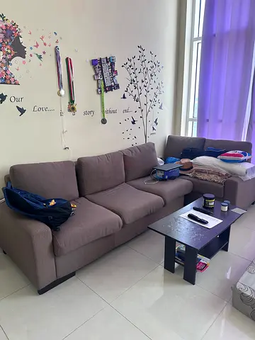 L-shaped 5-seater fabric sofa in brown - good condition with center table
