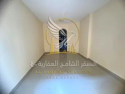 For annual rent Two-bedroom apartment with a living room in Al Rashidiya 1 Ajman Two bathrooms balcony with an open view clean finishing elegant entra