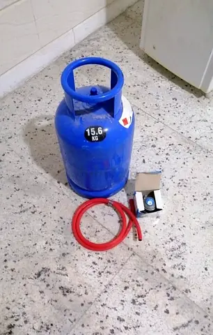 Brand new Adnoc gas cylinder with regulators and pipes with full gas