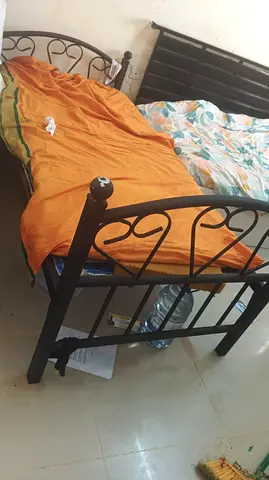 Single metal bed frame with headboard and footboard - used