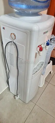 Standing hot  cold water dispenser with bottle - used, working