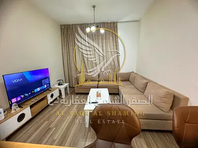 Furnished 1-bedroom apartment in City Tower on Khalifa Street, near Safeer Mall and opposite Grand Mall, with private parking, bills and internet incl