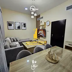 Luxury apartment, second occupancy, two bedrooms, living room, and open balcony. Ajman Corniche. Ful