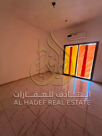 **Two-Bedroom Apartment for Annual Rent in Abu Shagara – Prime Location, Clean Finishes, Comfortable Layout, Close to All Essential Services, Suitable