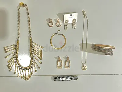 Mixed gold-tone and silver-tone jewelry set — necklaces, bracelets, earrings