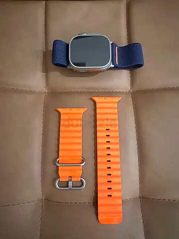 The Apple Watch Ultra 49mm titanium case and a ceramic back with various sensors.