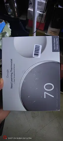 Google Nest Learning Thermostat - 70°F model, boxed