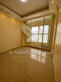 2BR apartment in Al Rawda 3, Ajman, with luxury finishes, private parking, one month free, and easy